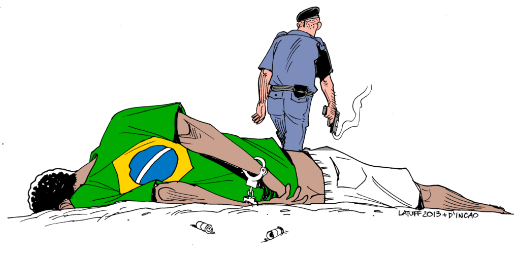 Charge assinada pelo cartunista Latuff, que mostra um policial com uma arma se afastando depois de atirar em um jovem negro algemado e e usando uma camiseta com a bandeira brasileira