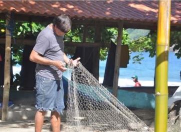 Oficina de fotos: pescador e sua rede na Praia do Sono, 2017. Foto: reprodução